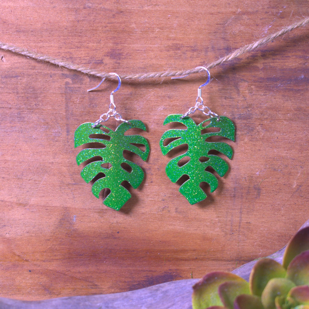 Small Monstera Earrings in sparkly green